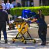 Paramedics pushing a gurny loaded with life saving equipment in Santa Barbara CA, USA USE THIS ONE